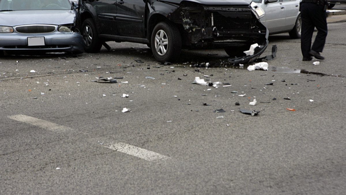 Debris spreads across an intersection after a multi car crash, the kind of scene car accident attorneys in Summerville start with
