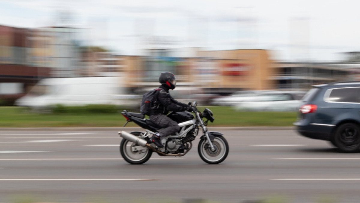 A motorcyclist rides in plain view on a busy road, the visibility motorcycle accident attorneys in Summerville set out to prove