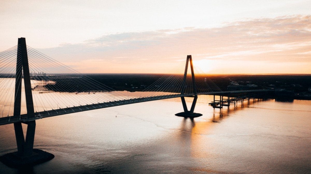 Sunset light falls on the Ravenel Bridge over the Cooper River, a US 17 crossing Mount Pleasant car accident lawyers know well