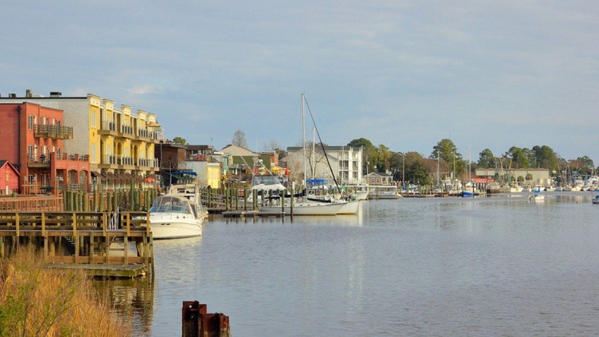 Sailboats rest beside wooden docks in the Georgetown harbor, a waterfront personal injury attorneys in Georgetown County know well