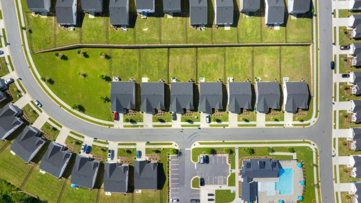 Rows of new homes curve around a community pool, growth that South Carolina personal injury attorneys see reflected in busier roads