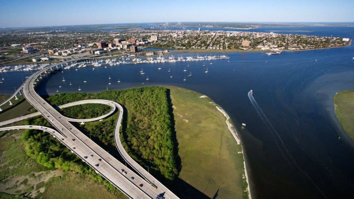 Ramps and a bridge cross the marsh and the Ashley River toward Charleston, roads West Ashley car accident lawyers know well